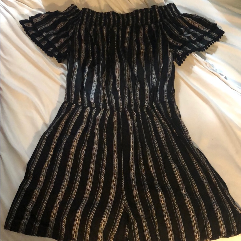 This is a romper. Never wore it just too small.